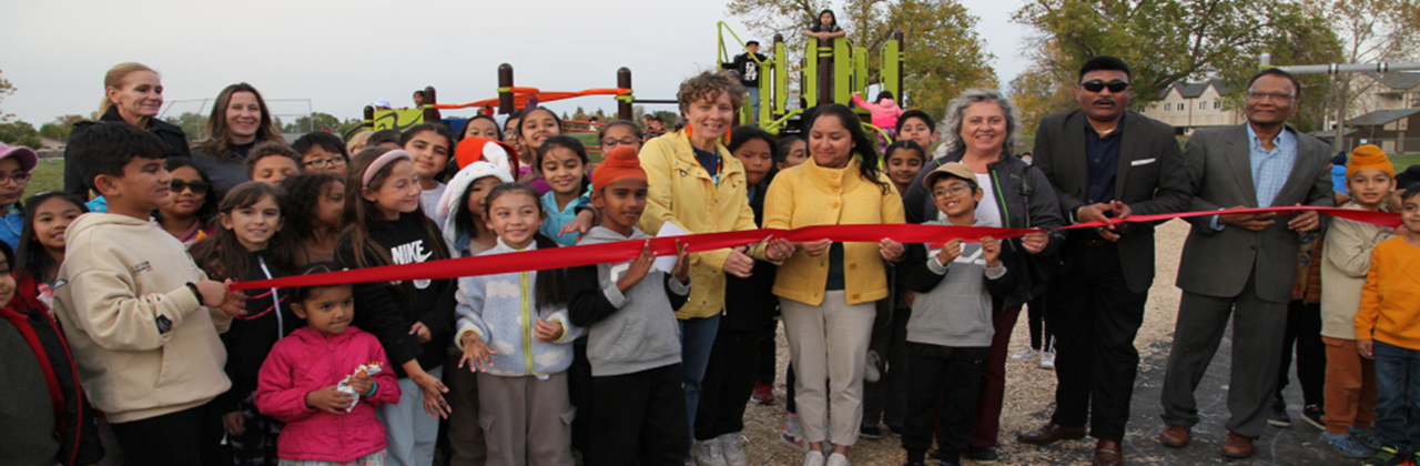 Ribbon cutting ceremony for Constable Finney's new playstructure